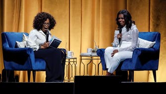 Michelle Obama begins arena tour for new book in talk with Oprah