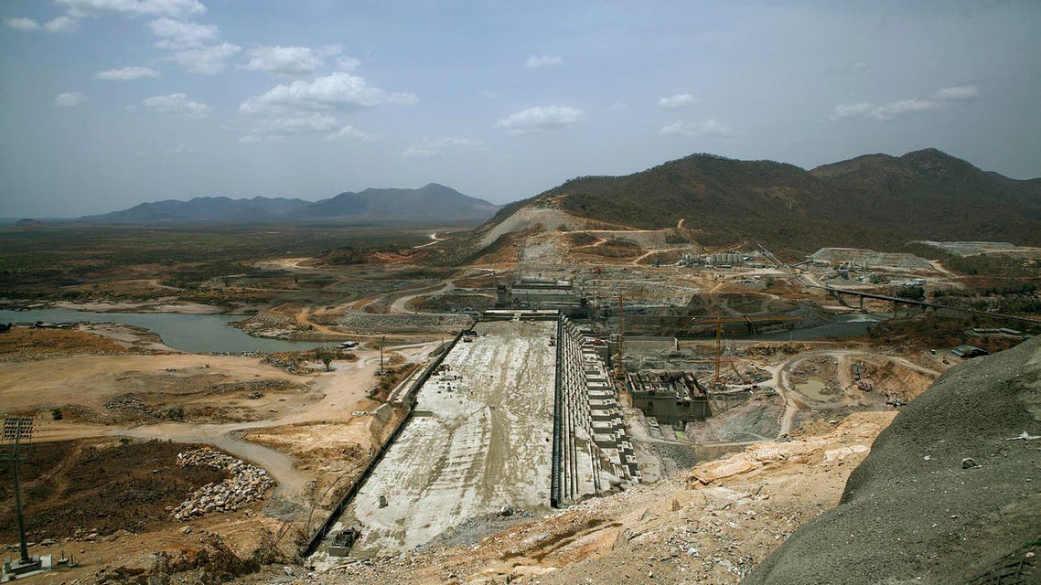 A photo taken on March 31, 2015 shows the Grand Renaissance Dam under construction near the Sudanese-Ethiopia border. Ethiopia began diverting the Blue Nile in May 2013 to build the 6,000 megawatt dam, which will be Africa's largest when completed in 2017. The leaders of Egypt and Ethiopia promised on March 24 to boost cooperation on the Nile river and turn a page on a long-running row over Addis Ababa's controversial dam project. Egypt, heavily reliant for millennia on the Nile for agriculture and drinking water, feared that the Grand Renaissance Dam would decrease its water supply. AFP PHOTO / ZACHARIAS ABUBEKER