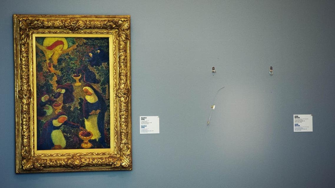 An empty space is seen where a painting by French artist Henri Matisse was stolen at the Kunsthal museum in Rotterdam, a day after seven masterpieces were stolen in a pre-dawn heist. (AFP)
