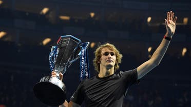 Alexander Zverev celebrates with the trophy after winning the final against Novak Djokovic. (Action Images via Reuters)