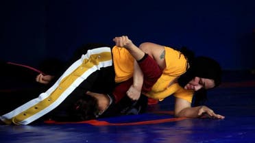 Grappling with taboos, Iraqi women join wrestling squad