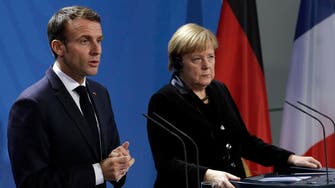 Macron, Merkel seek common approaches to Trump, euro