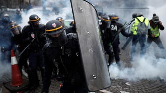French police clash with ‘yellow vest’ protesters angry over fuel taxes