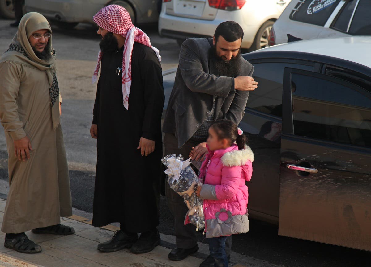 Syria's Hayat Tahrir al Sham return 4-year-old girl to her belgian mother. (AFP)
