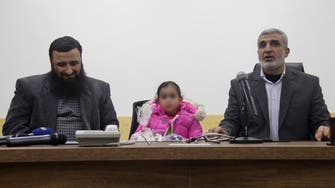 Syria militant group hands 4-year-old to her Belgian mother 