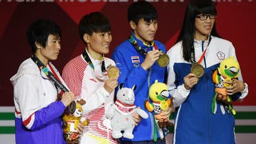 The medal ceremony for the women’s feather (57-60kg) boxing final at the 2018 Asian Games in Jakarta on September 1, 2018. (AFP)