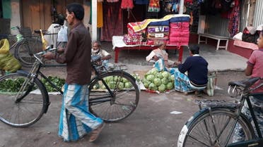 Villagers in Bihar routinely visit markets wearing lungi. (Supplied)