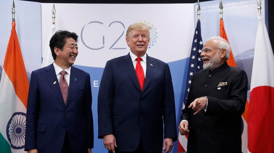 Trump, Modi and Shinzo Abe. (AP)