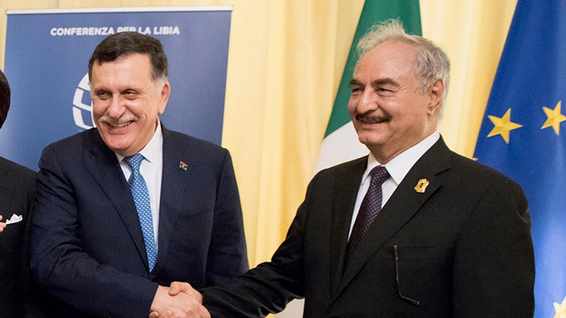 This photo taken and handout on November 13, 2018 by the Italian prime minister Palazzo Chigi's press office, shows Italian Prime Minister Giuseppe Conte (C), head of the UN-backed unity government in Tripoli, Prime Minister Fayez al-Sarraj (2ndR), self-proclaimed Libyan National Army (LNA) Chief of Staff, Khalifa Haftar (R), EU President Donald Tusk (2ndL) and Russian Prime Minister Dmitry Medvedev (L) meeting on the sidelines of an international conference on Libya in Palermo. Eastern Libyan strongman Khalifa Haftar said on November 13 he will not join other key players at Palermo talks to try to stabilise the North African nation, casting a shadow over the latest international bid to kick-start a long-stalled political process and trigger elections.