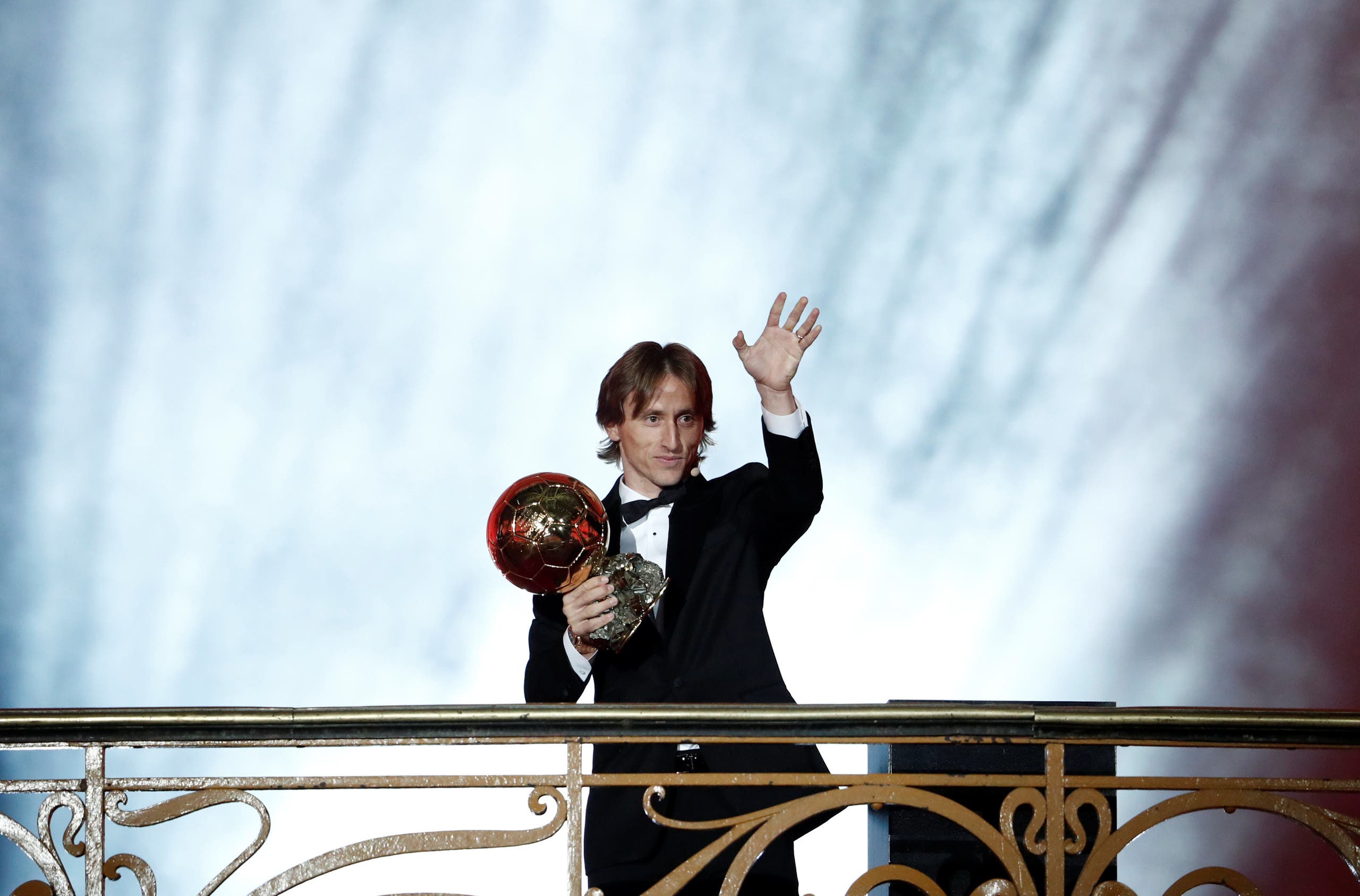 Modric holding the Ballon d'Or