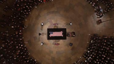 Vice President Mike Pence and wife Karen help lay a wreath as Former President George H. W. Bush lies in state in the US Capitol Rotunda Monday. (Reuters)