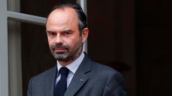 French PM confirms fuel tax suspensions, calls for calm  