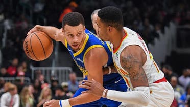 Golden State Warriors guard Stephen Curry (30) is guarded by Atlanta Hawks guard Kent Bazemore (24) during the first half at State Farm Arena. (Dale Zanine/USA TODAY Sports)