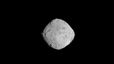 asteroid Bennu from a distance of 85 miles (136 km). (AFP)