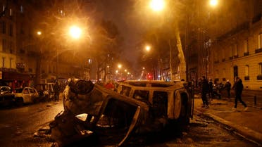 Charred cars are pictured after a demonstration on Saturday, December 1, 2018, in Paris. (AP)