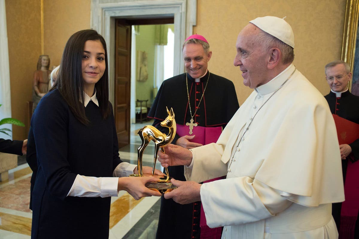 Syrian refugee mardini and Pope (AFP)