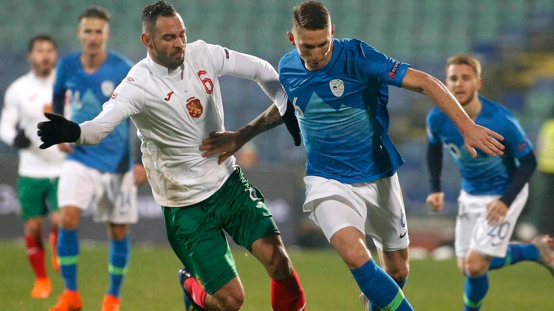 Slovenia’s Jaka Bijol, right, challenges Bulgaria’s Simeon Slavchev, during the Nations League soccer match at Vassil Levski stadium in Sofia, Monday, Nov. 19, 2018. (AP)