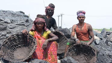 Coal loaders take a rest at an open cast mine in the eastern Indian state of Jharkhand on April 30, 2018. (File photo: AFP)