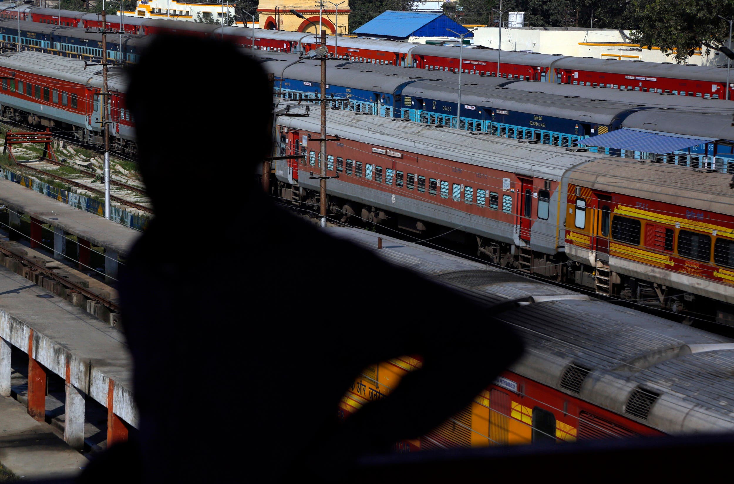 In this Nov. 29, 2018 photo, an Indian man stands at Jayanagar train station in India from where a 34 kilometers long rail track connects to Janakpur in southeastern Nepal. (AP)