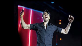An energetic Enrique Iglesias interacts with audience during Riyadh concert