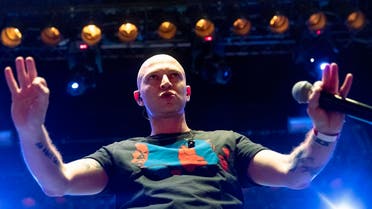 Rapper Oxxxymiron, whose real name is Miron Fyodorov, performs during a concert in support of rapper Husky, whose real name is Dmitry Kuznetsov, in Moscow, Russia, Monday, Nov. 26, 2018. (AP)