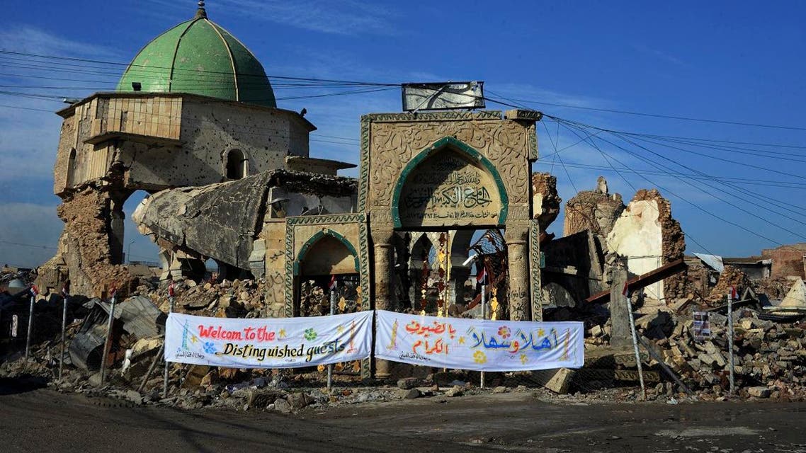 The Great Mosque of al-Nuri and the remains of “Al-Hadba” leaning minaret in Mosul’s war-ravaged Old City, during the placing of the corner stone ceremony. (AFP)