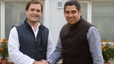 Praveen Chakravarty (right) with Congress Party chief Rahul Gandhi. (Suplied)