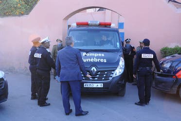 A picture taken on December 20, 2018, shows Moroccan police officers waiting outside a morgue in the capital Marrakesh, ahead of the transportation of the bodies of the two murdered Scandinavian hikers to the airport. (AFP)