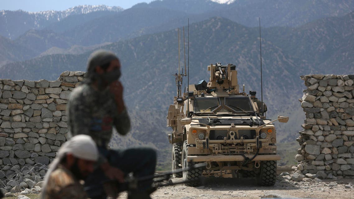 US forces and Afghan security police in Asad Khil near the site of a US bombing in Achin district of Jalalabad, east of Kabul, on April 17, 2017. (AP)