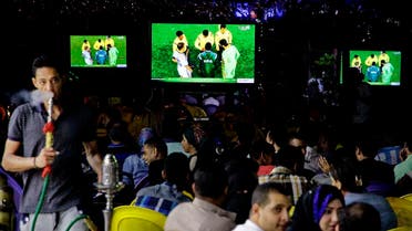 fans watch the World Cup match between Germany and Algeria at a cafe in Cairo, Egypt. (AP)