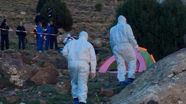 In this photo provided by Moroccan news channel 2M and taken on Tuesday, Dec. 18, 2018, a forensic team is seen at the area where the bodies of two Scandinavian women tourists were found dead. (AP)