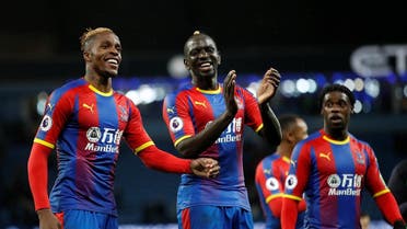 Crystal Palace's Wilfried Zaha and Mamadou Sakho celebrate after the match. (Reuters)