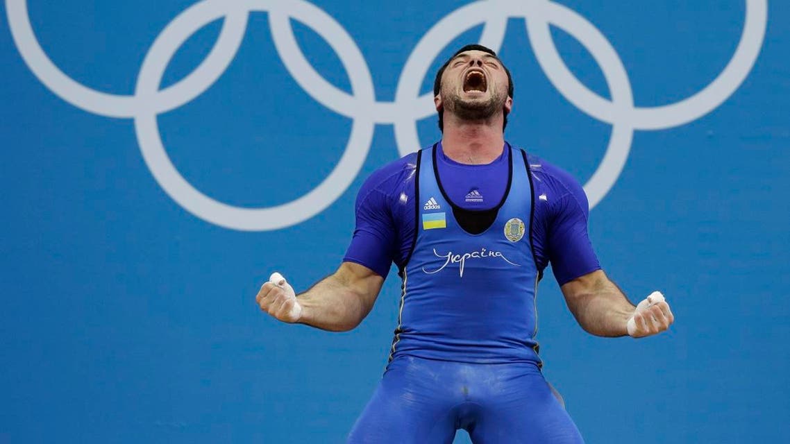 Oleksiy Torokhtiy of Ukraine reacts during the men's 105-kg weightlifting competition at the 2012 Summer Olympics. (File photo: AP)