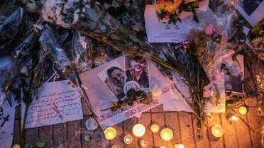 Moroccans hold vigil for slain Scandinavian tourists. (AP)