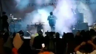 Shocking video: Tsunami rips through stage as band performs