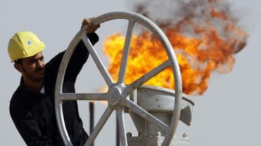 In this July 17, 2009 file photo, an Iraqi worker operates valves at the Nahran Omar oil refinery near the city of Basra, 550 km southeast of Baghdad, Iraq. (File photo: AP)