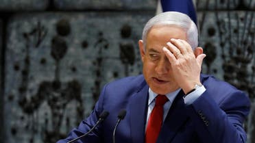 Israeli Prime Minister Benjamin Netanyahu gestures as he speaks during a ceremony whereby Amir Yaron is sworn in as Bank of Israel governor. (Reuters)