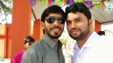 Pastor Zeeshan Alam with a guest at South Waziristan Church. (Supplied)