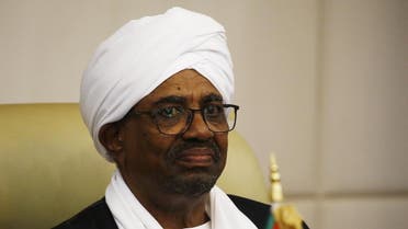 Sudanese President Omar al-Bashir overseas the new ministers sworn in at the presidential palace in the capital Khartoum on September 15 2018. (AFP)