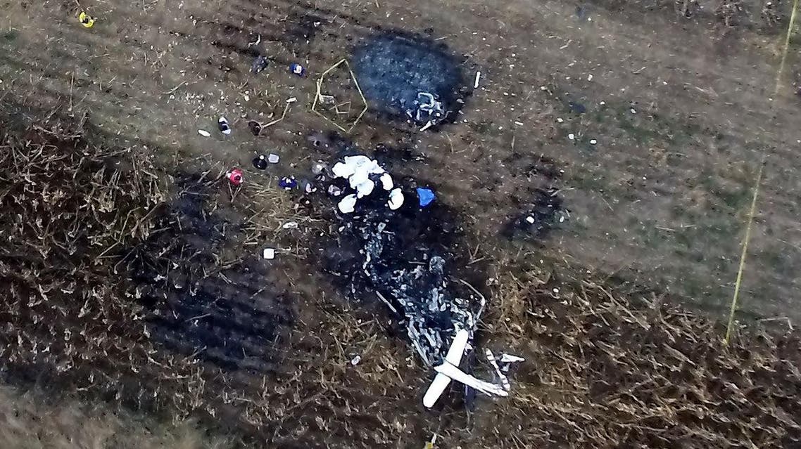 Emergency rescue personnel, the army and the police arrive to the scene of a helicopter crash where Puebla Gov. Martha Erika Alonso and her husband Rafael Moreno Valle, a former Puebla governor, died near Puebla City, southeast of Mexico City on Monday, Dec. 24, 2018. (AFP)