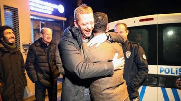 Austrian journalist Max Zirngast hugs a relative as he is released from Sincan prison in Ankara on December 24, 2018. (AFP)