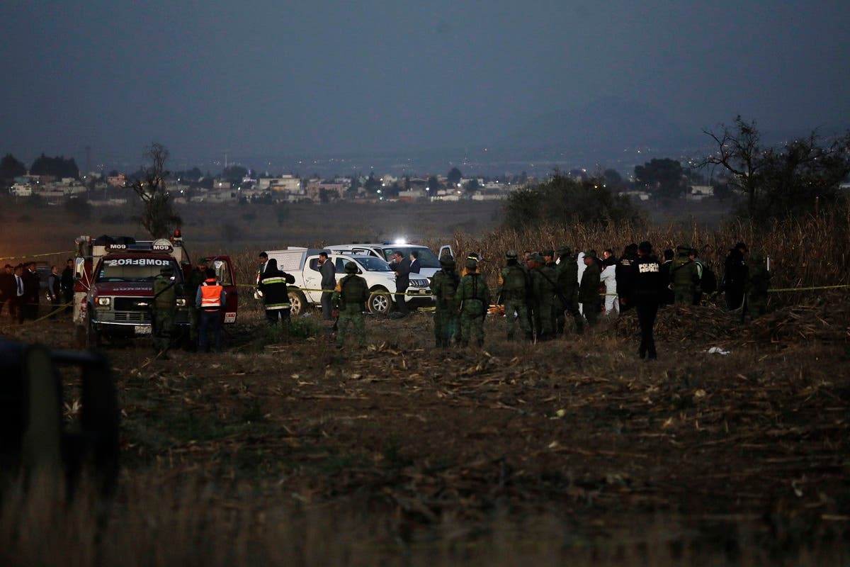Emergency rescue personnel, the army and the police arrive to the scene of a helicopter crash where Puebla Gov. Martha Erika Alonso and her husband Rafael Moreno Valle, a former Puebla governor, died near Puebla City, southeast of Mexico City on Monday, Dec. 24, 2018. (AP)