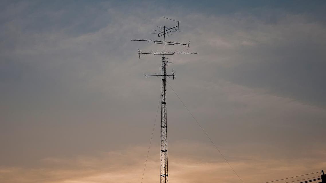 Telecommunication tower mast TV antennas. (Shutterstock)