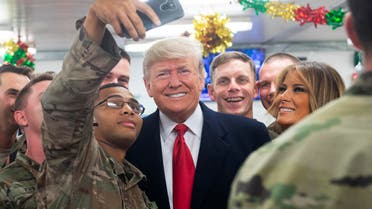 President Trump and Melania greet members of the US military during unannounced trip to Al Asad Air Base in Iraq on December 26, 2018. (AFP)