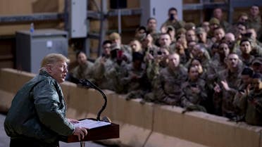 Trump visits US troops in Iraq. (AP)