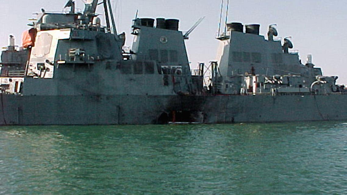 File photo taken Oct. 12, 2000 shows the port side of the USS Cole damaged after a bomb exploded during a refueling operation in Aden. (AFP)