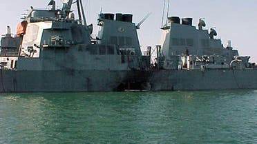 File photo taken Oct. 12, 2000 shows the port side of the USS Cole damaged after a bomb exploded during a refueling operation in Aden. (AFP)