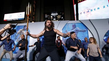 Cast member Momoa performs a haka dance at the premiere for "Aquaman" in Los Angeles. (Reuters)