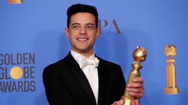 Rami Malek poses with his Best Performance by an Actor in a Motion Picture - Drama for "Bohemian Rhapsody". (Reuters)