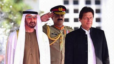 Abu Dhabi's Crown Prince Sheikh Mohamed bin Zayed Al-Nahyan (2L) attends a welcoming ceremony next to Pakistani Prime Minister Imran Khan (R) at the Prime Minister House in Islamabad. (AFP)